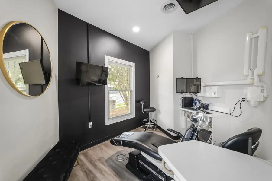 Dental treatment room with chair and equipment