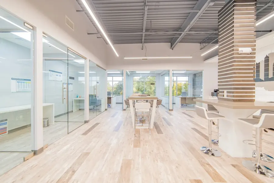 Bright commercial workspace with glass offices