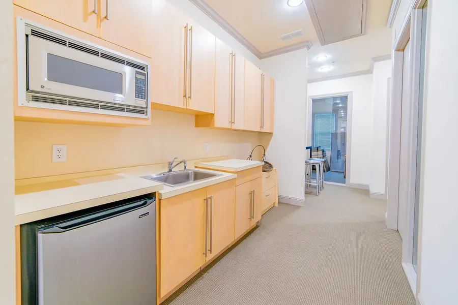 Residential kitchen with light cabinetry